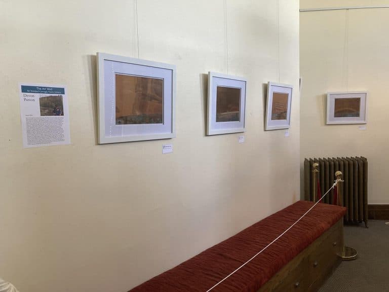 Devon Parson's metallic art on display at Trinidad library Art Wall