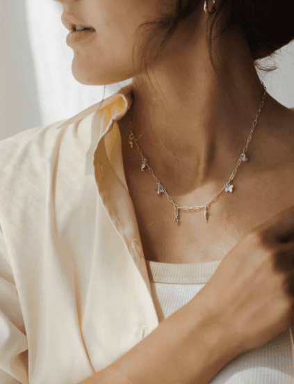 Ethical charm necklaces blend sustainability, personalization, and everyday wearability