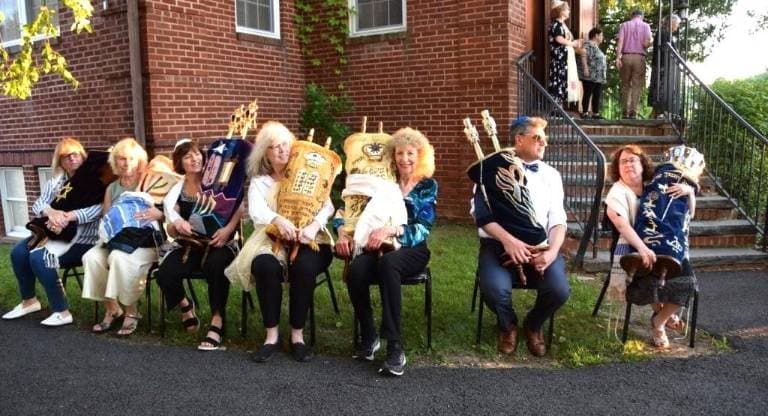 Monroe synagogues merge into Beit Kulanu after Torah procession