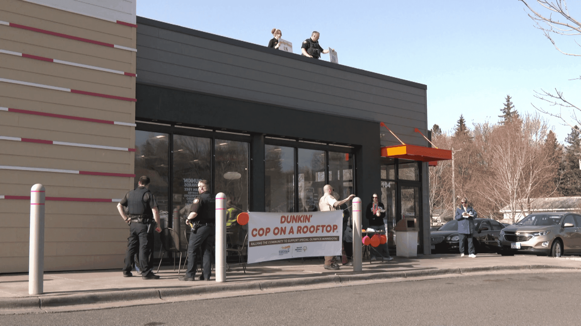 Duluth officers take to Dunkin’ roof for Special Olympics fundraiser