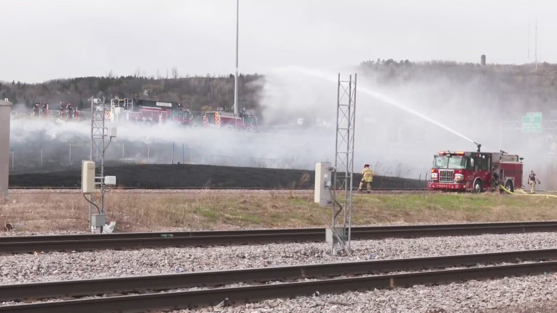 Dry conditions spark multiple grass fires, close I-35 ramp in Duluth